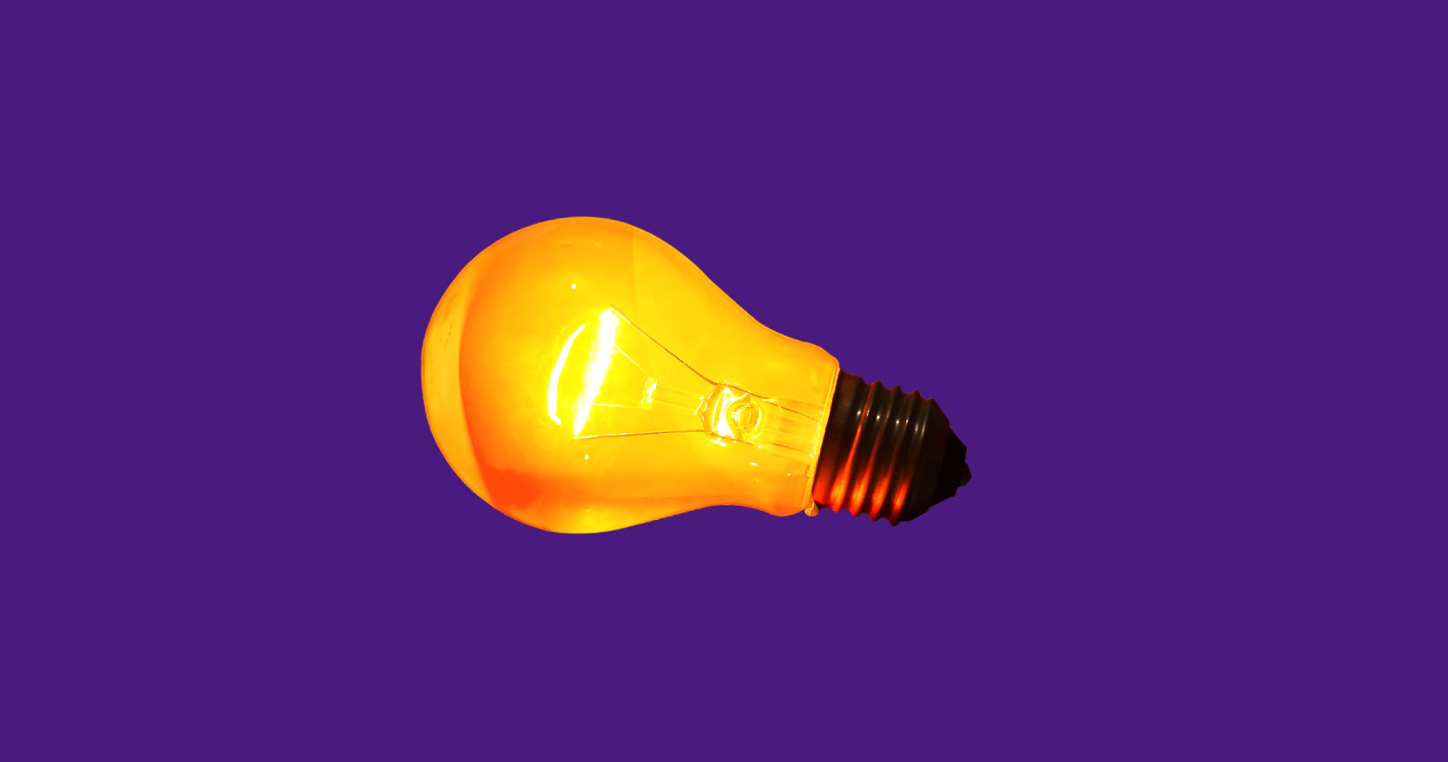Illustration of a colorful lightbulb on a dark background.
